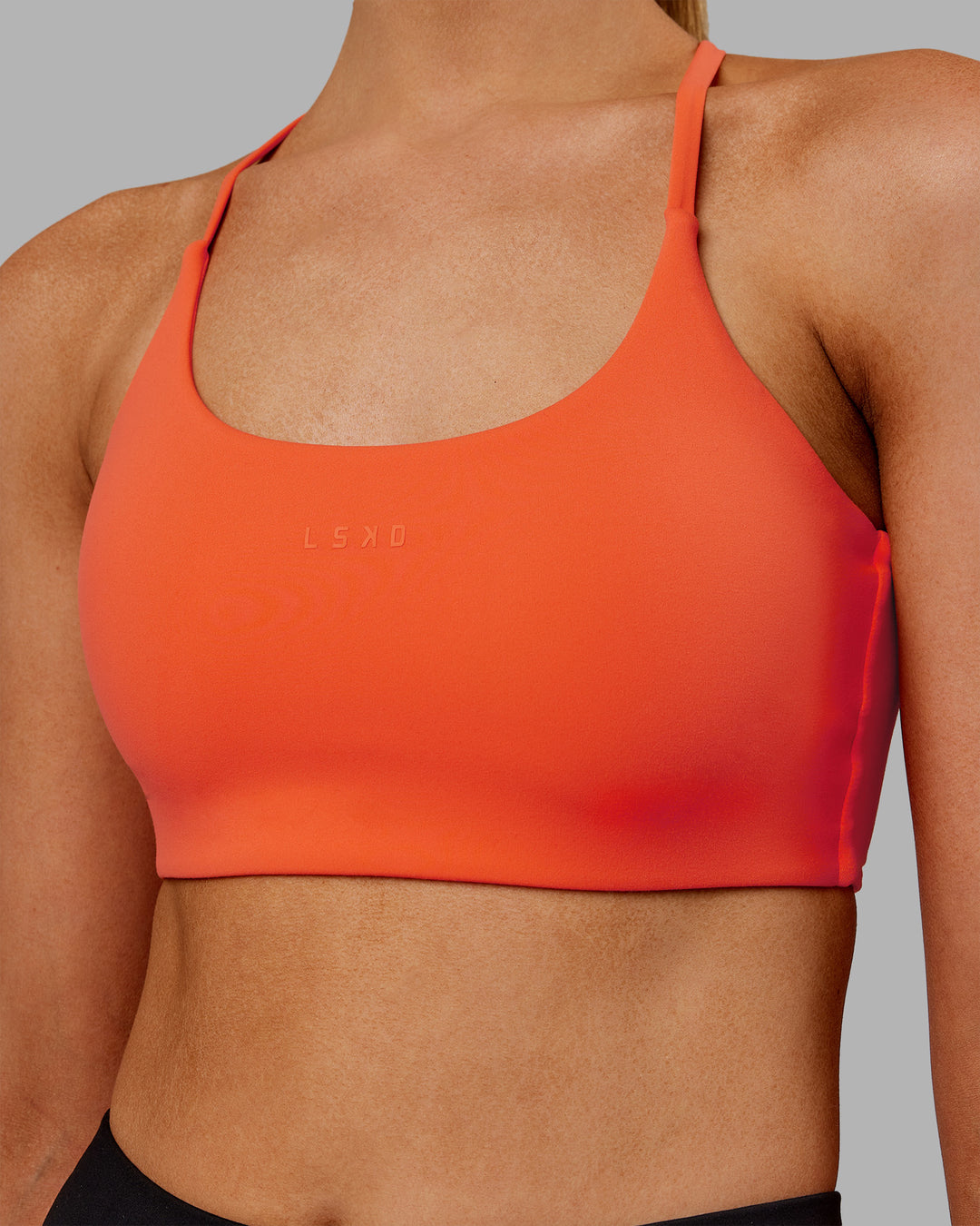 Woman wearing Twist Sports Bra - Ultra Orange | Model:Ella | Size:S - view 6
