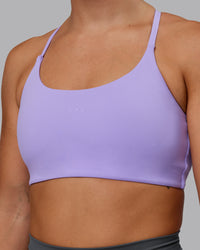 Woman wearing Twist Sports Bra in Violet Ray | Size:S | Thumbnail Index: 5