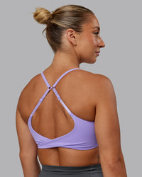 Woman wearing Twist Sports Bra in Violet Ray | Size:S | Thumbnail Index: 3