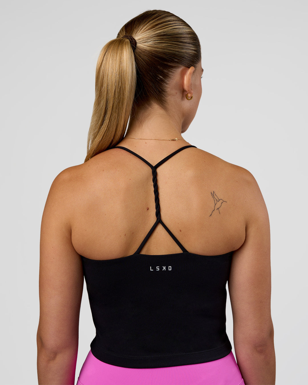 Woman wearing Twister Shelf Bra Tank - Black | Model:Myrte | Size:S - view 5