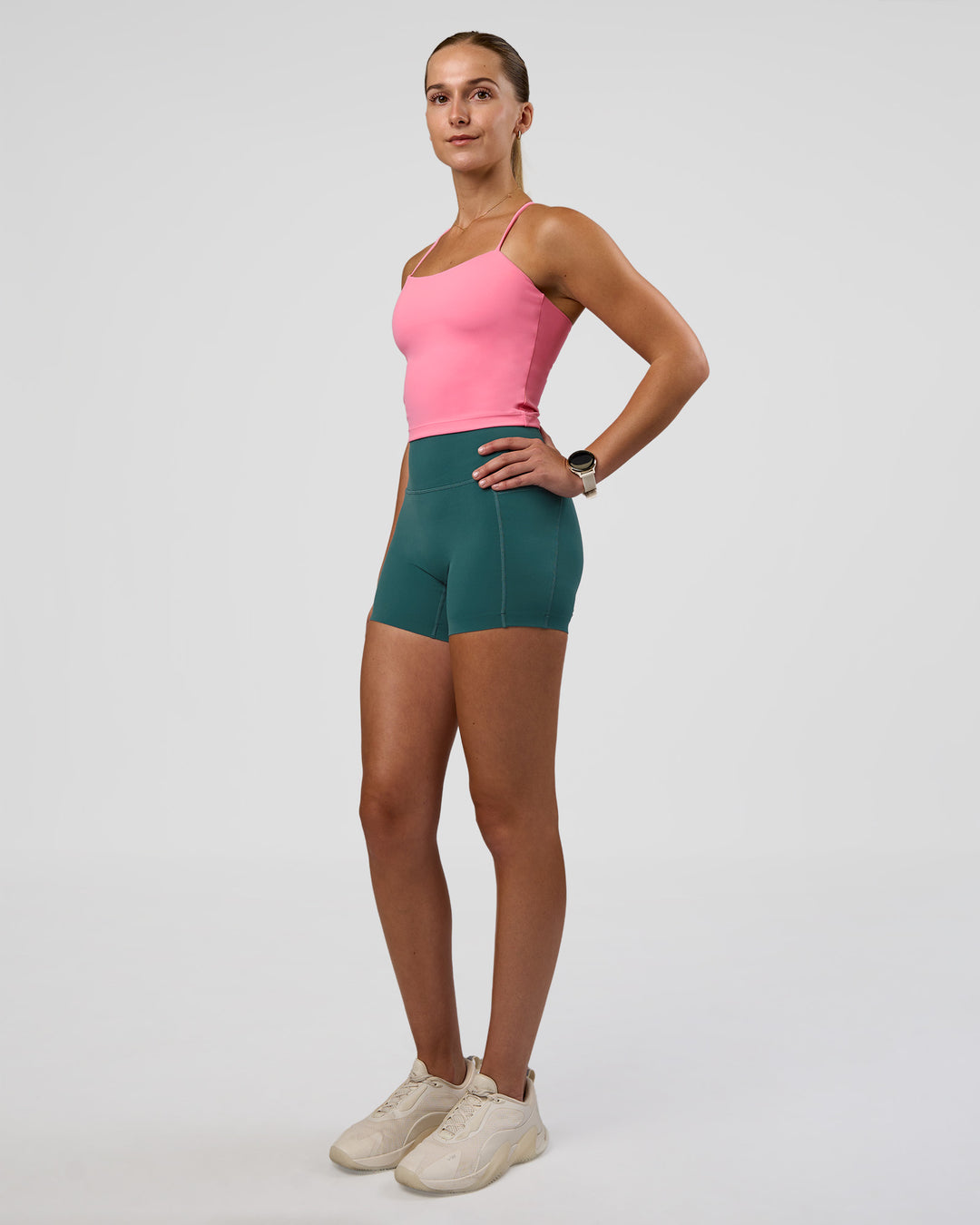 Woman wearing Twister Shelf Bra Tank - Candy Pink | Model:Myrte | Size:S - view 6