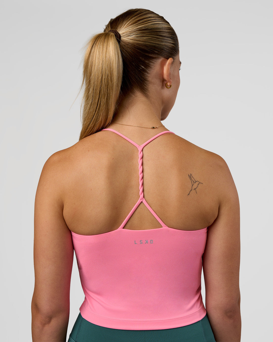 Woman wearing Twister Shelf Bra Tank - Candy Pink | Model:Myrte | Size:S - view 2