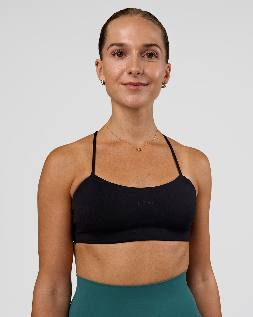 Woman wearing Twister Sports Bra - Black  | Model:Myrte | Size:S - view 2