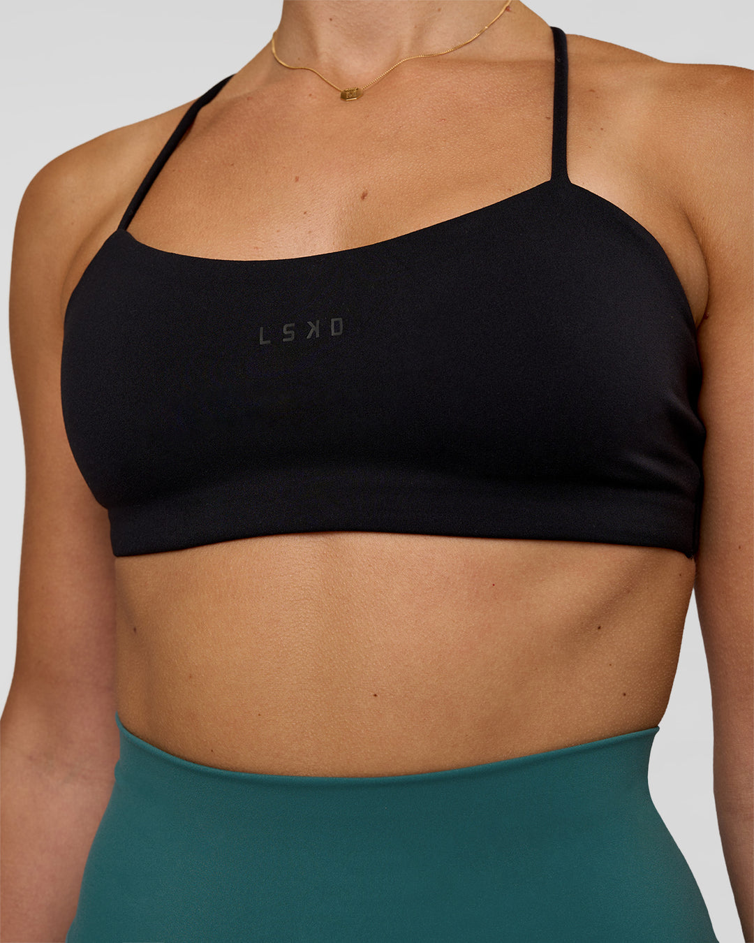 Woman wearing Twister Sports Bra - Black  | Model:Myrte | Size:S - view 5