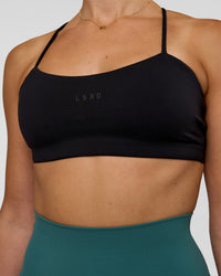 Woman wearing Twister Sports Bra - Black  | Model:Myrte | Size:S | Thumbnail Index: 4