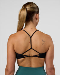 Woman wearing Twister Sports Bra - Black  | Model:Myrte | Size:S | Thumbnail Index: 5