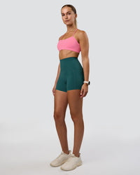 Woman wearing Twister Sports Bra - Candy Pink | Model:Myrte | Size:S | Thumbnail Index: 4