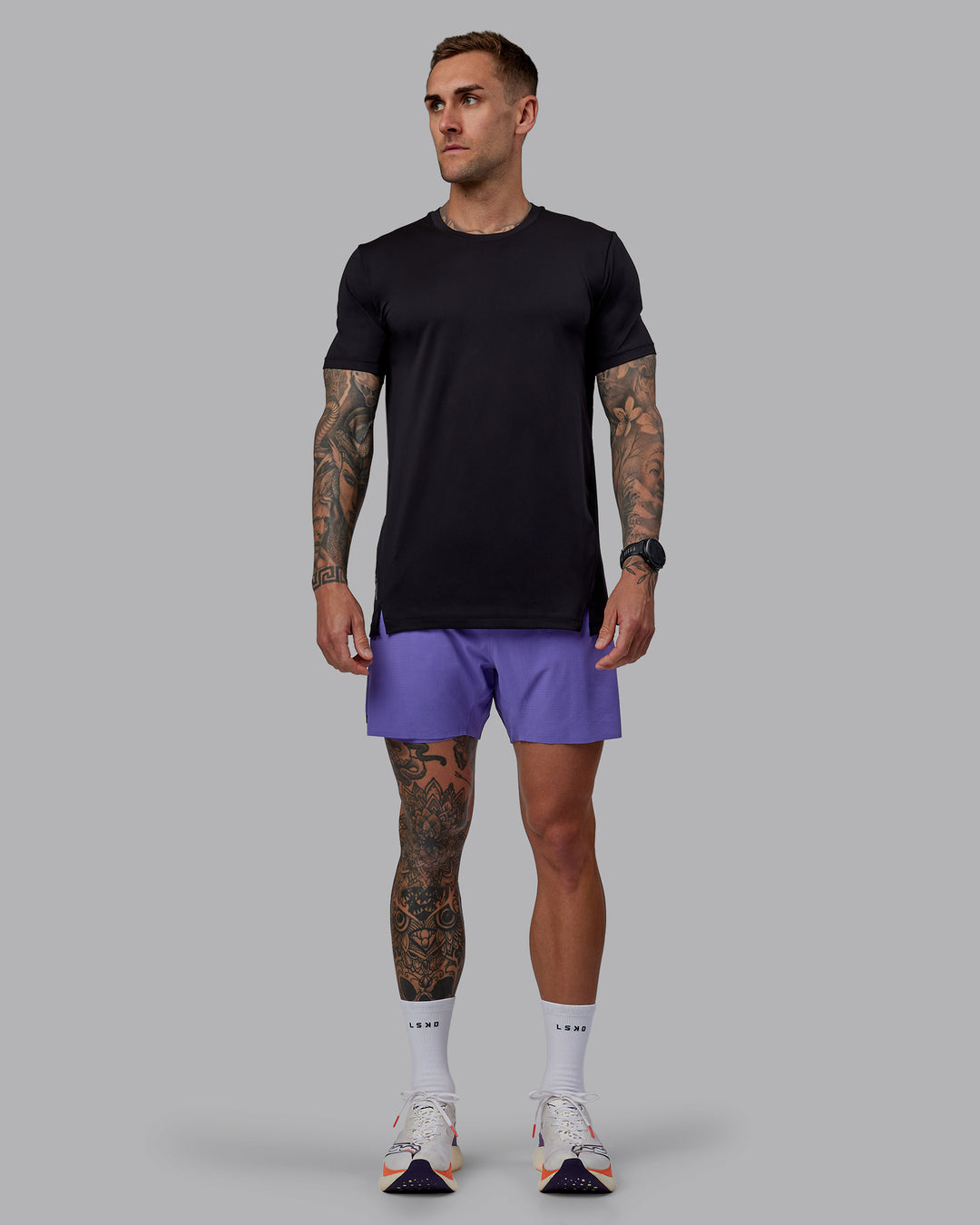 Man wearing UltraAir 5" Lined Performance Shorts - Dahlia Purple - view 7
