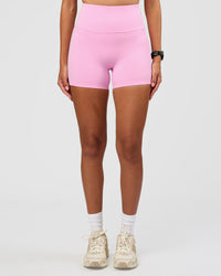 Woman wearing Unbreakable Ultra High-Rise 4" Short - Pink Rose-White | Model:Rhiley | Size:S | Thumbnail Index: 6