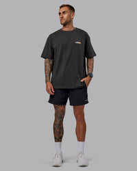 Man wearing Unisex E.T.J FLXCotton Tee Oversize - Pirate Black-Pop Pink | Thumbnail Index: 9