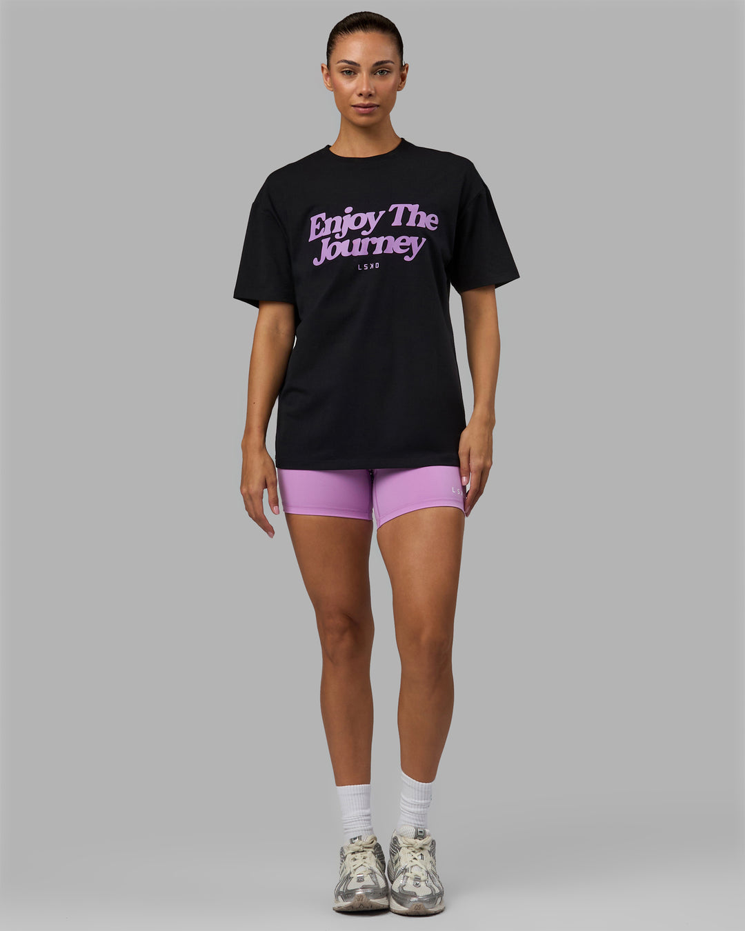 Woman wearing Unisex Enjoy The Journey FLXCotton Tee Oversize - Black-Light Violet - view 11