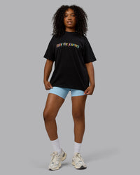 Woman wearing Unisex Enjoy The Journey Heavyweight Tee Oversize - Black-Multi | Thumbnail Index: 5