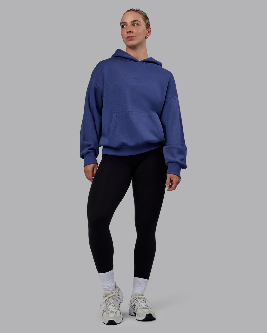 Woman wearing Unisex MVP Hoodie Oversize - Future Dusk - view 5