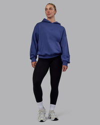 Woman wearing Unisex MVP Hoodie Oversize - Future Dusk | Thumbnail Index: 4
