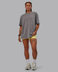 Woman wearing Unisex Miami25 Washed FLXCotton Tee Oversize - Storm Front-Lemon Fizz | Thumbnail Index: 6