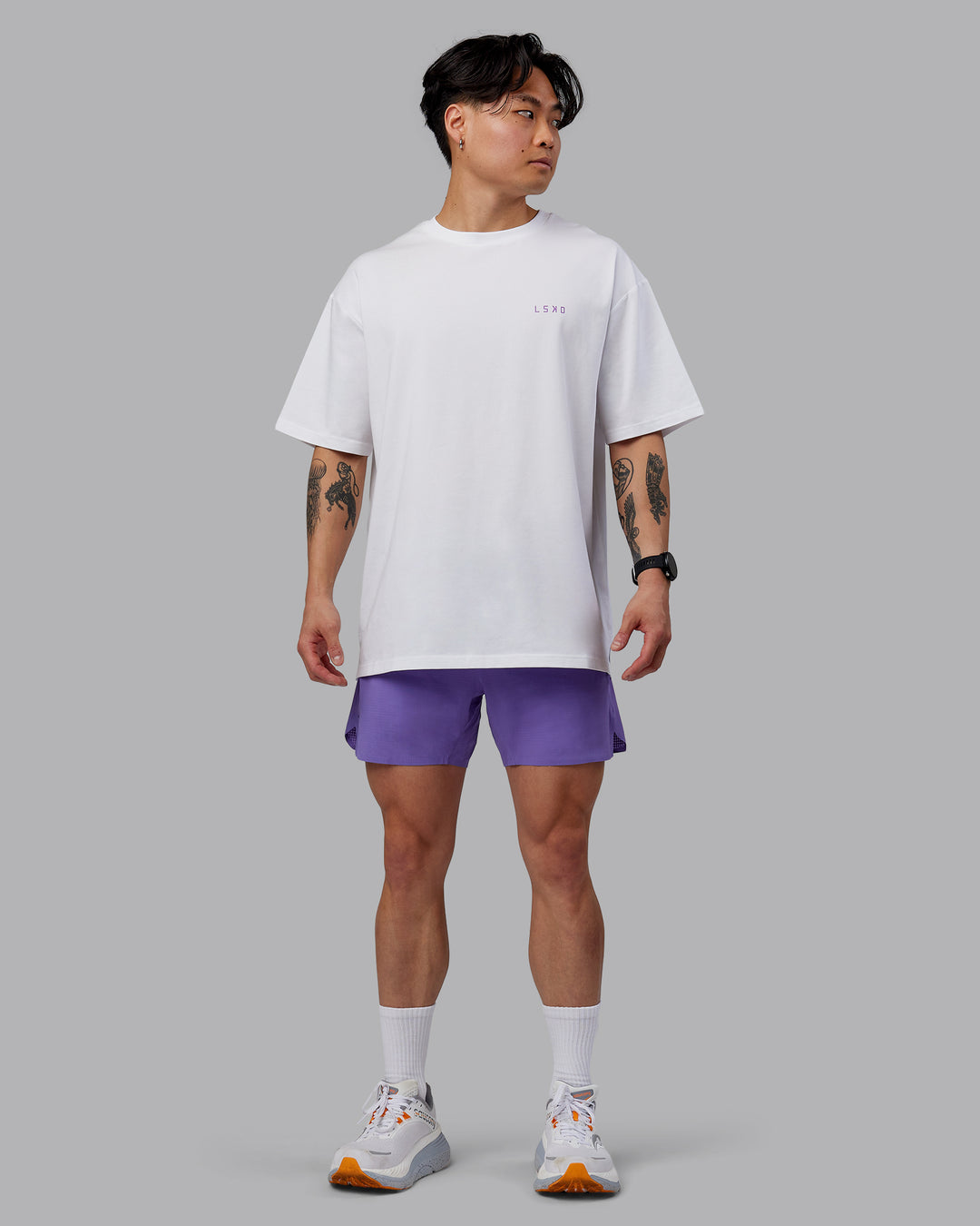 Man wearing Unisex Strike Through FLXCotton Tee Oversize - White-Purple Swirl - view 11