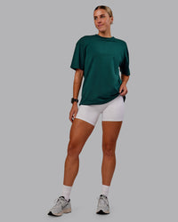 Woman wearing Variation FLXCotton Oversized Tee in Dark Moss-Digital Mist | Size:S | Thumbnail Index: 11