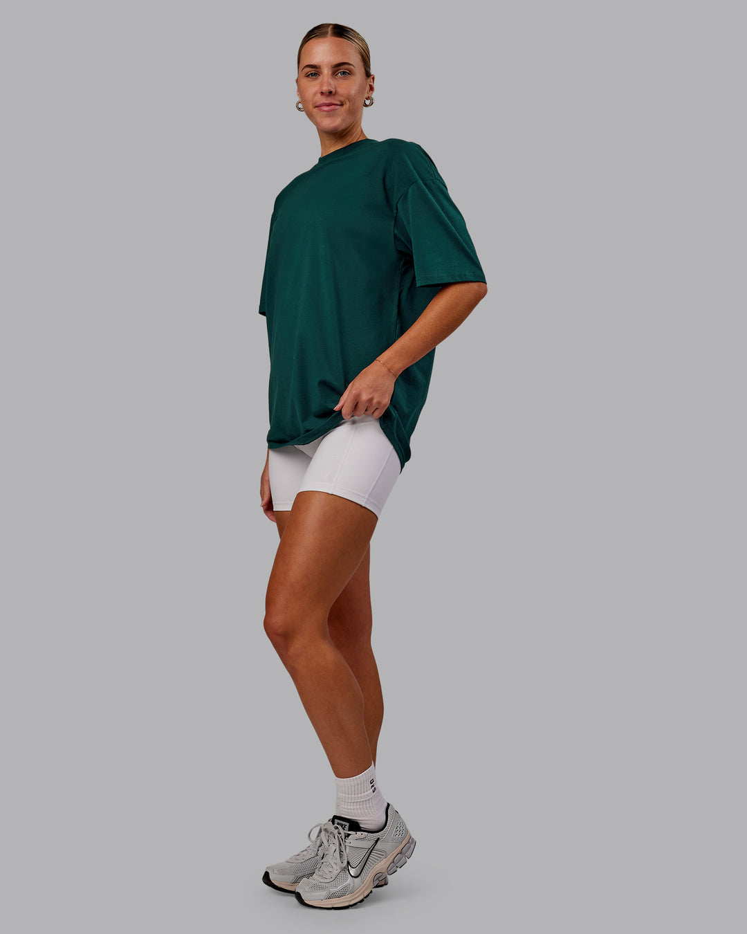 Woman wearing Variation FLXCotton Oversized Tee in Dark Moss-Digital Mist | Size:S - view 5