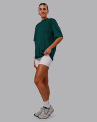 Woman wearing Variation FLXCotton Oversized Tee in Dark Moss-Digital Mist | Size:S | Thumbnail Index: 4