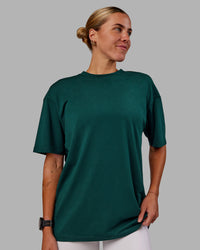 Woman wearing Variation FLXCotton Oversized Tee in Dark Moss-Digital Mist | Size:S | Thumbnail Index: 2