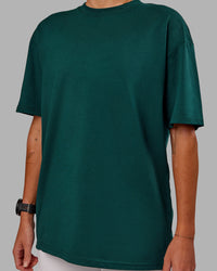 Woman wearing Variation FLXCotton Oversized Tee in Dark Moss-Digital Mist | Size:S | Thumbnail Index: 7