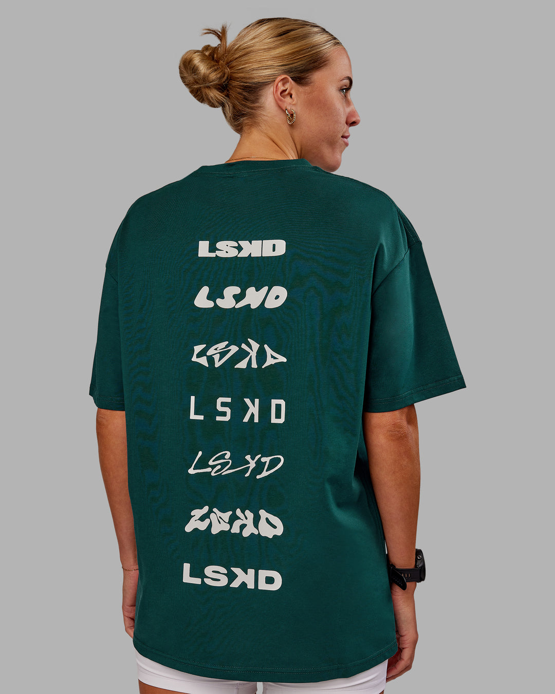 Woman wearing Variation FLXCotton Oversized Tee in Dark Moss-Digital Mist | Size:S - view 7