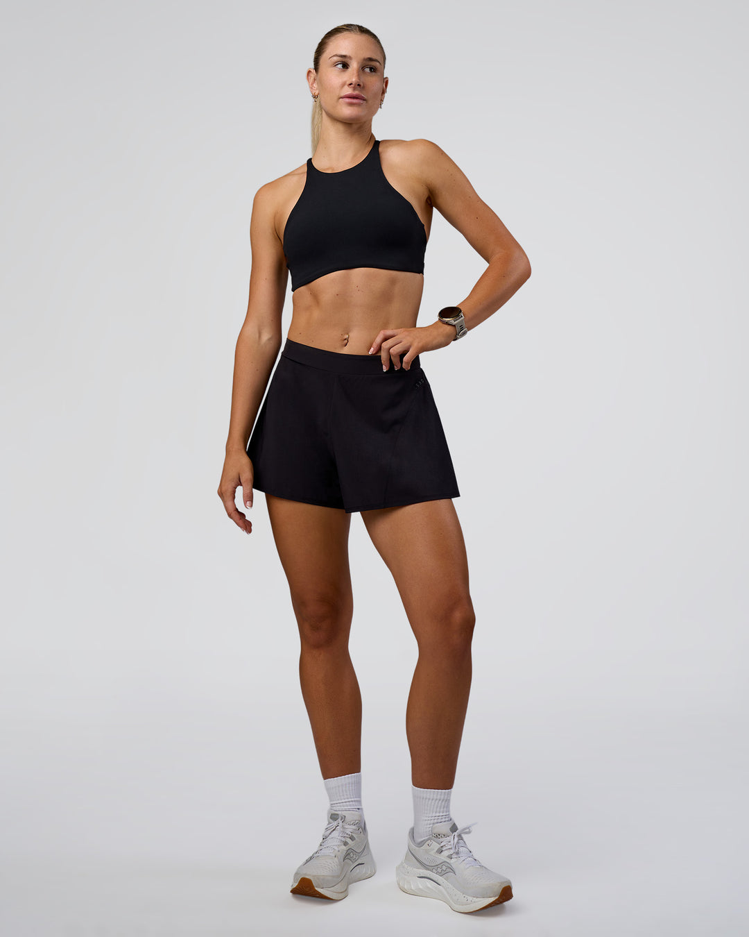 Woman wearing Unstoppable Lined Short - Black | Model:Emelia | Size:S - view 2