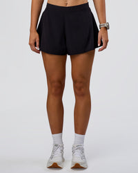 Woman wearing Unstoppable Lined Short - Black | Model:Emelia | Size:S | Thumbnail Index: 4