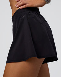 Woman wearing Unstoppable Lined Short - Black | Model:Emelia | Size:S | Thumbnail Index: 6