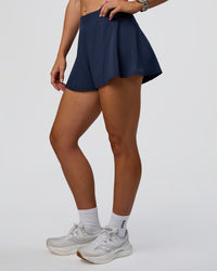 Woman wearing Unstoppable Lined Short - Future Navy | Model:Emelia | Size:S | Thumbnail Index: 0