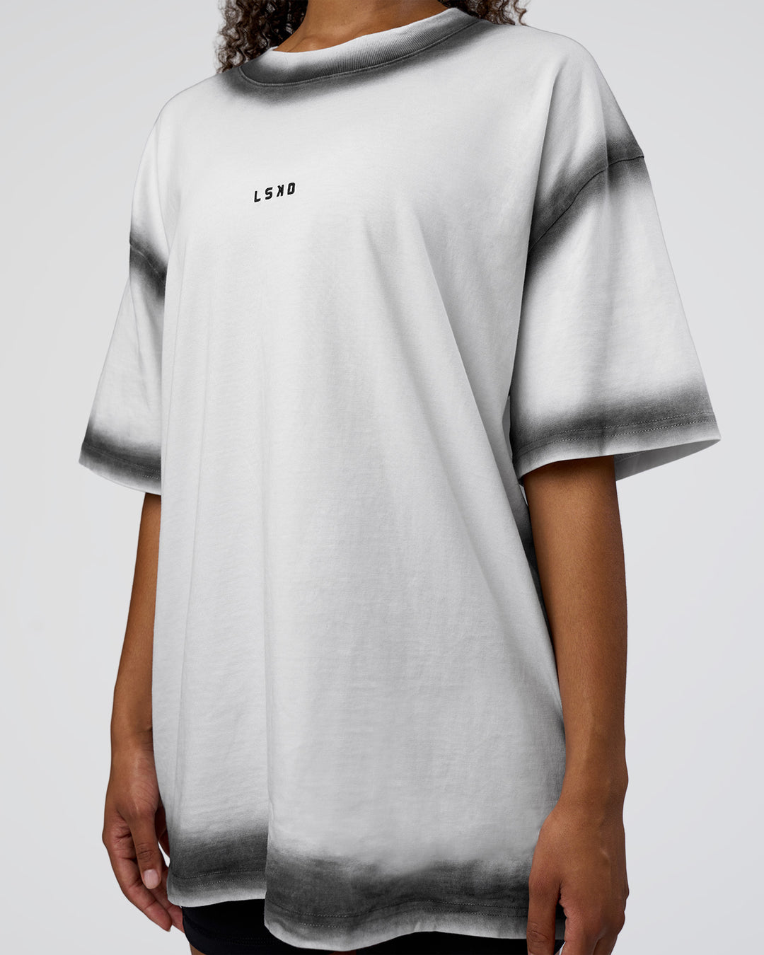 Woman wearing Urban Blur Heavyweight Unisex Oversized Tee - White-Black | Model:Jordan | Size:S - view 10