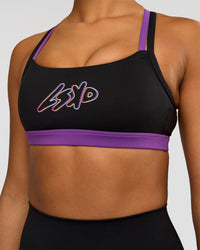Woman wearing Velocity Graphic Sports Bra - Black-Radiate | Model:Rosie | Size:S | Thumbnail Index: 1