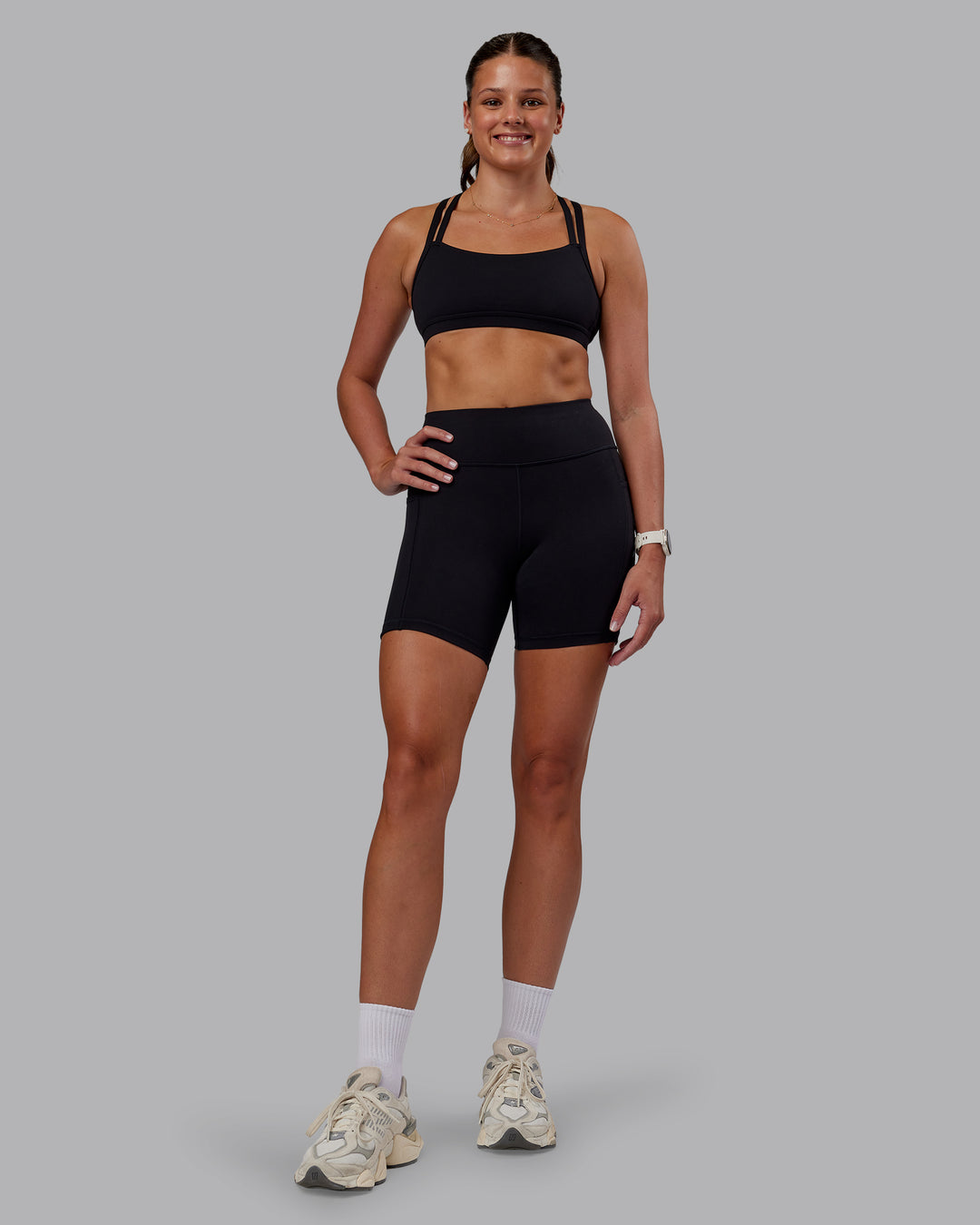Woman wearing Velocity Sports Bra - Black | Model:Phoebe | Size:S - view 5