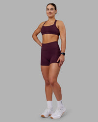 Woman wearing Velocity Sports Bra - Cherry Lacquer | Model:Keisha | Size:S | Thumbnail Index: 3