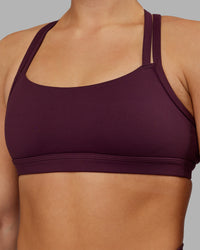 Woman wearing Velocity Sports Bra - Cherry Lacquer | Model:Keisha | Size:S | Thumbnail Index: 4