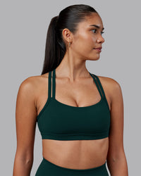 Woman wearing Velocity Sports Bra - Dark Moss | Model:Rhiley | Size:S | Thumbnail Index: 0