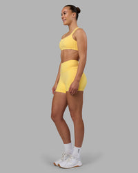 Woman wearing Velocity Sports Bra - Lemon | Model:Charlize | Size:S | Thumbnail Index: 5