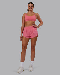 Woman wearing Velocity Sports Bra -- Pink Lemonade | Model:Phoebe | Size:S | Thumbnail Index: 4