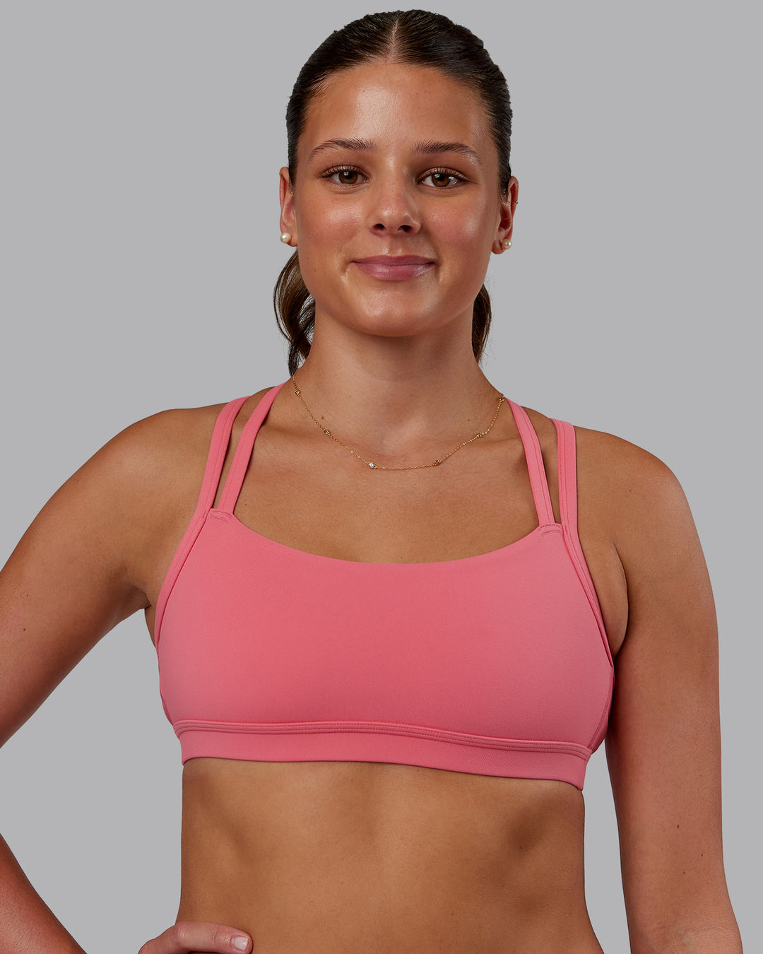 Woman wearing Velocity Sports Bra - Pink Lemonade | Model:Phoebe | Size:S - view 2