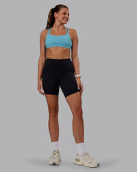Woman wearing Velocity Sports Bra - Retro Blue | Model:Phoebe | Size:S | Thumbnail Index: 4