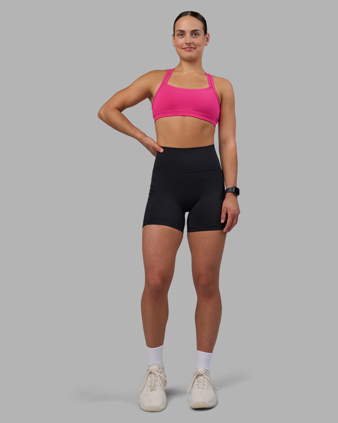 Woman wearing Velocity Sports Bra - Ultra Pink | Model:Keisha | Size:S - view 9