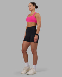 Woman wearing Velocity Sports Bra - Ultra Pink | Model:Keisha | Size:S | Thumbnail Index: 10