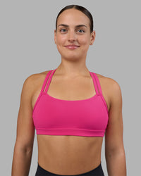 Woman wearing Velocity Sports Bra - Ultra Pink | Model:Keisha | Size:S | Thumbnail Index: 9