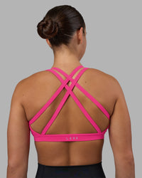 Woman wearing Velocity Sports Bra - Ultra Pink | Model:Keisha | Size:S | Thumbnail Index: 6