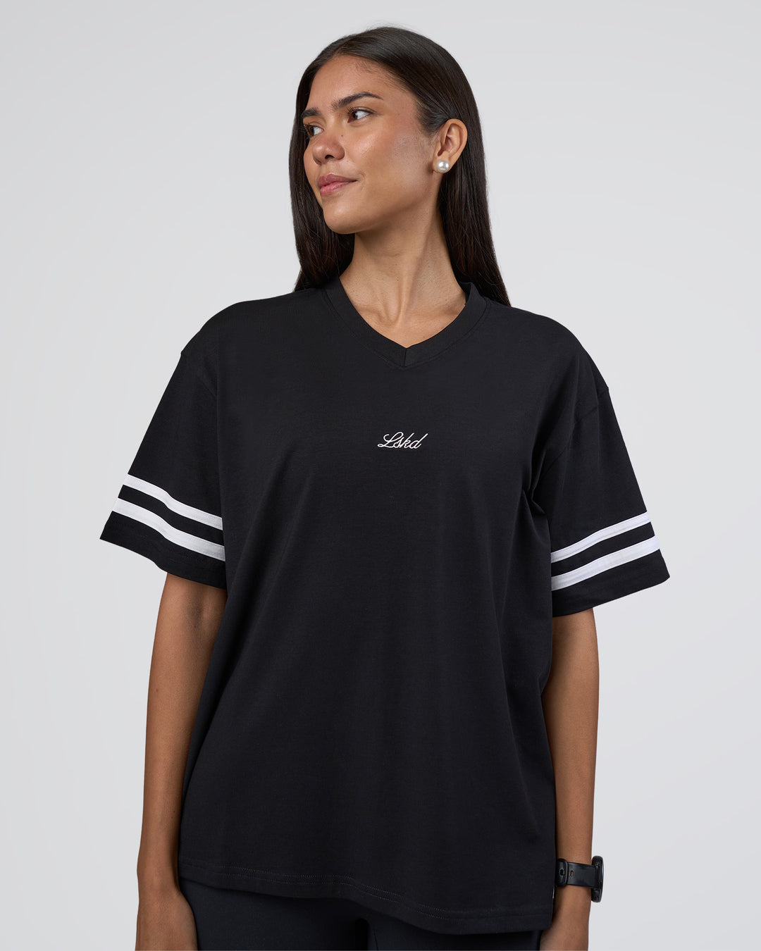 Woman wearing Victory FLXCotton Oversized Tee - Black-White | Model:Rhiley | Size:S - view 1