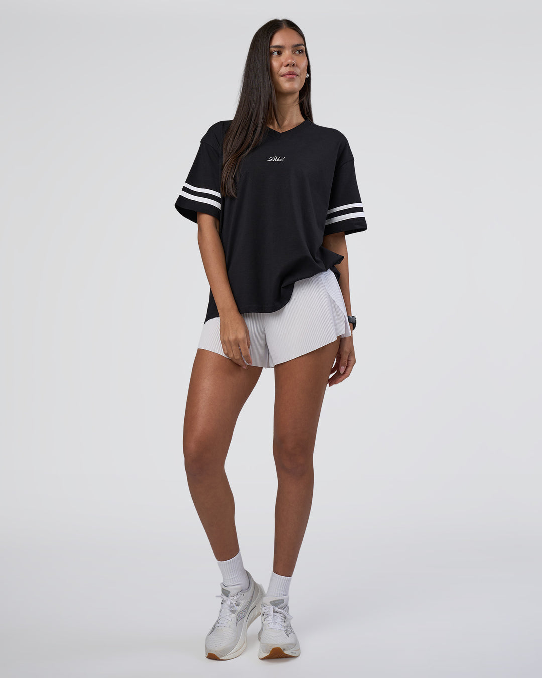 Woman wearing Victory FLXCotton Oversized Tee - Black-White | Model:Rhiley | Size:S - view 2