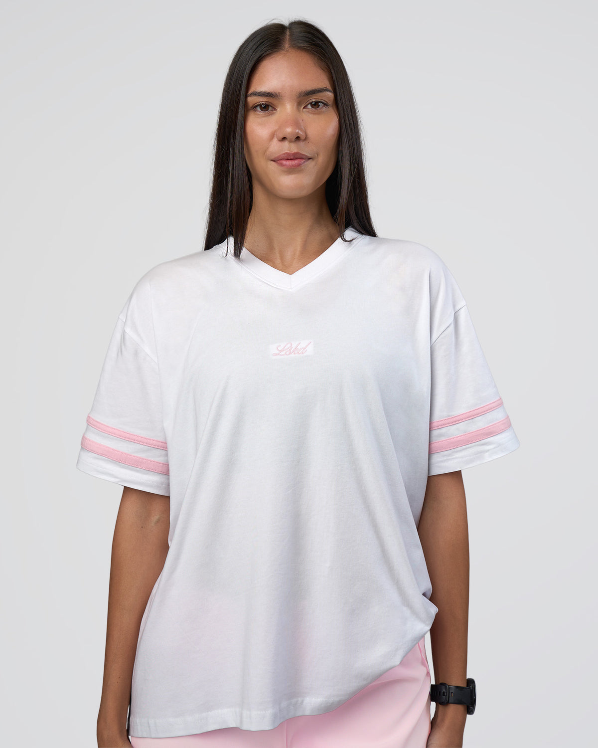 Woman wearing Victory FLXCotton Oversized Tee - White-Marshmallow | Model:Rhiley | Size:S