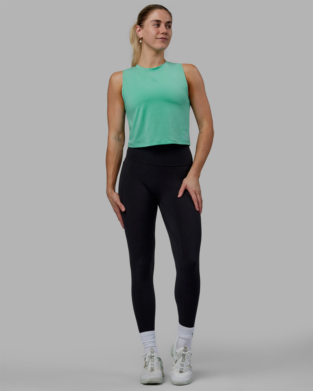 Woman wearing Vital Cropped Training Tank - Cockatoo - view 6