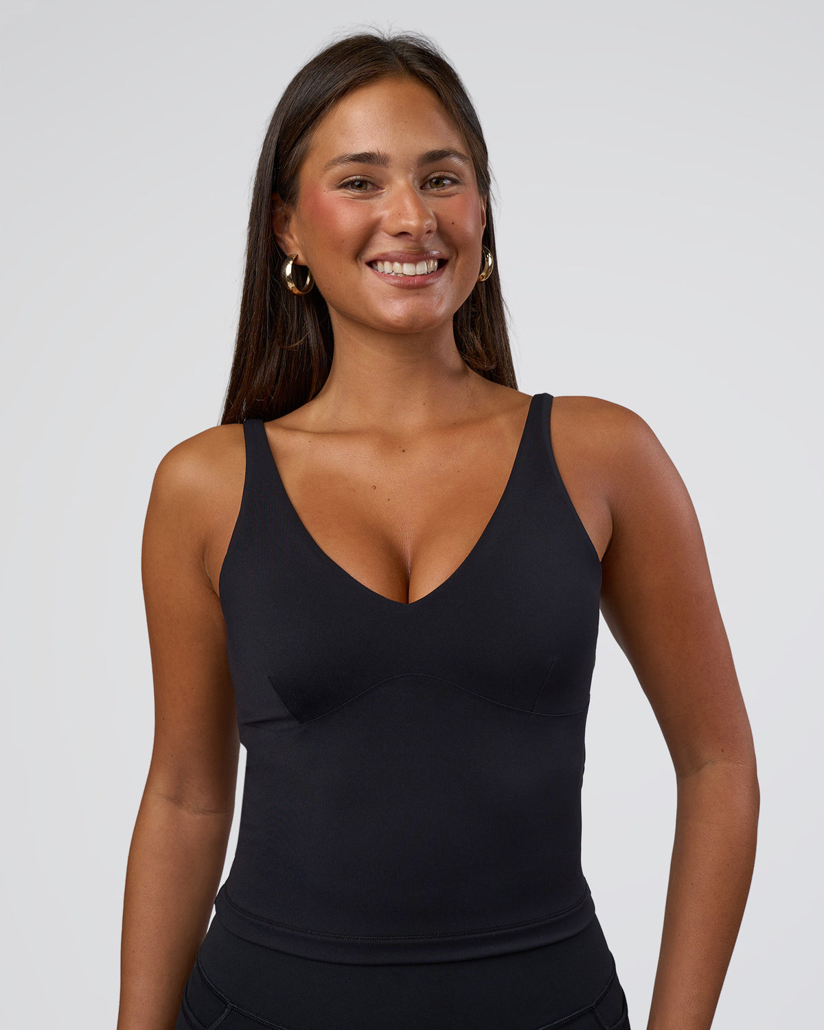 Woman wearing Vitality Active Tank - Black | Model:Bianca | Size:S - view 1