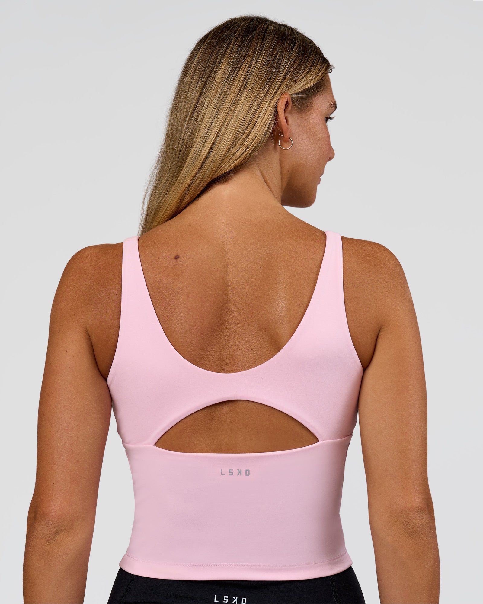 Woman wearing Vitality Active Tank - Marshmallow | Model:Amity | Size:S